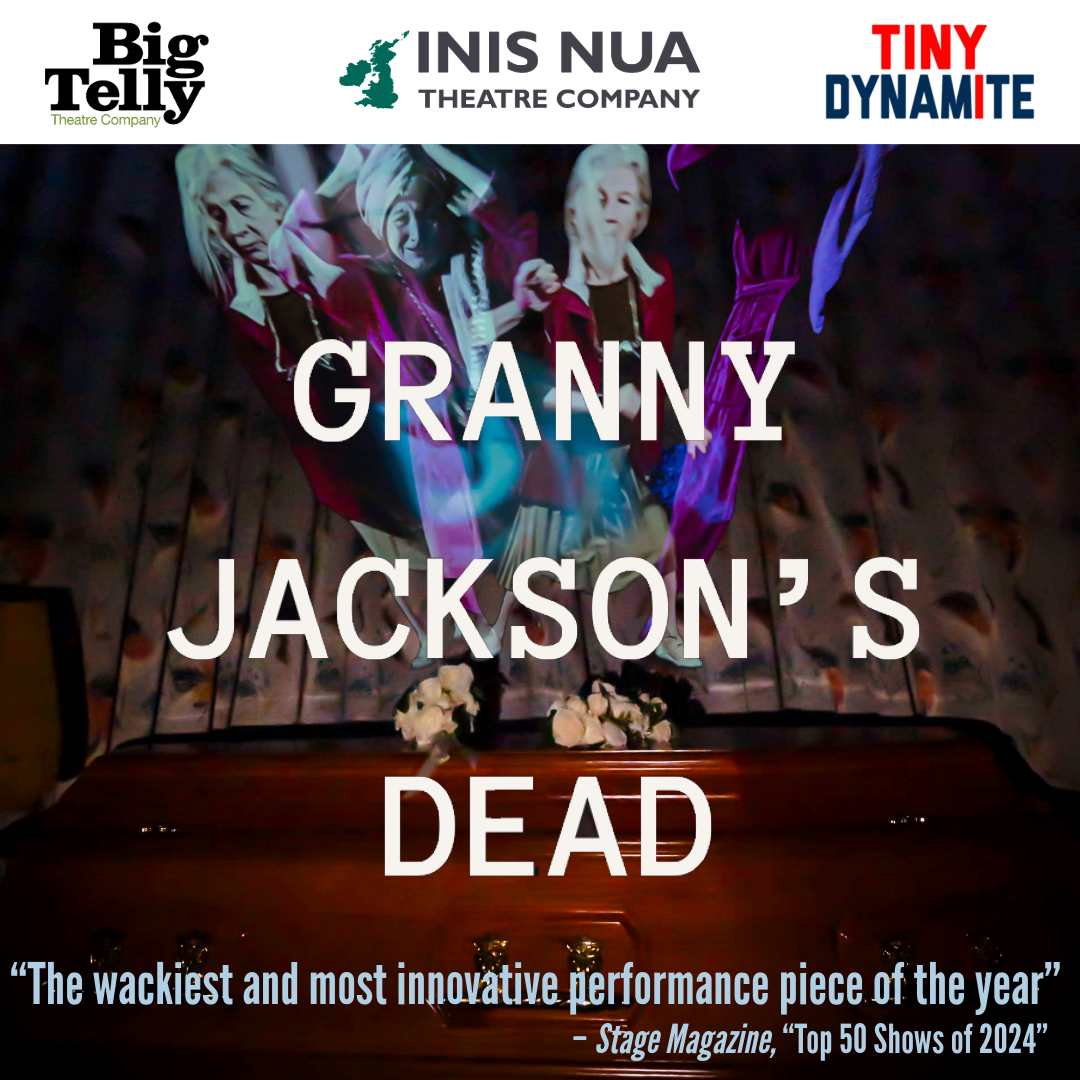 A coffin in a dark room with a projection of a dancing older woman, with the text Granny Jackson's Dead